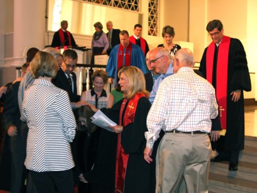 Group of people gathering at a church
