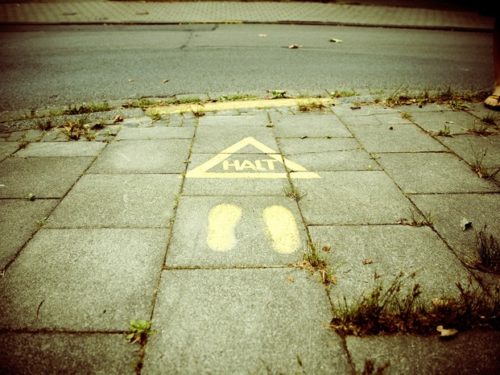 Sidewalk with the word "halt" on it