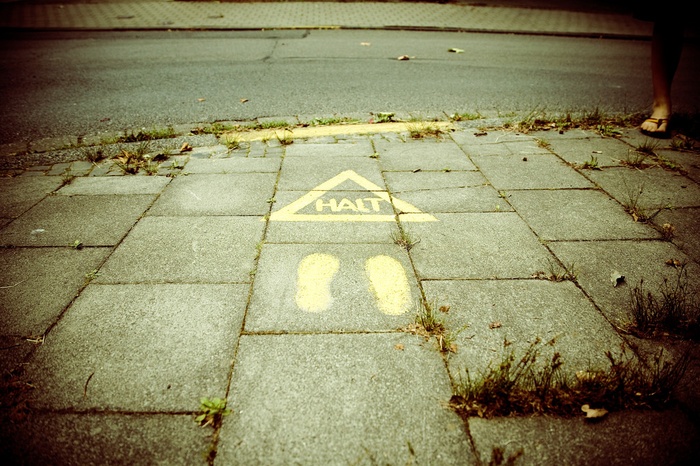Sidewalk with the word "halt" on it